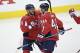 Washington Capitals left wing Alex Ovechkin (8), of Russia, celebrates with defenseman Brooks Orpik (44) after overtime in Game 2 of an NHL hockey first-round playoff series against the Carolina Hurricanes, Saturday, April 13, 2019, in Washington. The Capitals won 4-3 in overtime. (AP Photo/Nick Wass)
