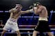 Gennady Golovkin lands a punch against Canelo Alvarez during a middleweight title boxing match, Saturday, Sept. 15, 2018, in Las Vegas. (AP Photo/Isaac Brekken)