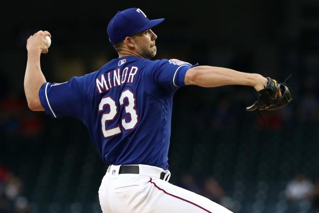 ARLINGTON, TEXAS - APRIL 16:  Mike Minor #23 of the Texas Rangers throws against the Los Angeles Angels in the first inning at Globe Life Park in Arlington on April 16, 2019 in Arlington, Texas. (Photo by Ronald Martinez/Getty Images)