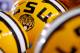 The LSU logo is seen on a helmet during the first half of an NCAA college football game in Baton Rouge, La., Saturday, September 6, 2014. (AP Photo/Jonathan Bachman)