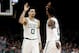 Boston Celtics' Jayson Tatum high fives with Kyrie Irving during the second quarter of an NBA basketball game against the Indiana Pacers Friday, March 29, 2019, in Boston. (AP Photo/Winslow Townson)
