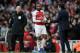 LONDON, ENGLAND - DECEMBER 22: Alexandre Lacazette of Arsenal speaks to Unai Emery, Manager of Arsenal during the Premier League match between Arsenal FC and Burnley FC at Emirates Stadium on December 22, 2018 in London, United Kingdom. (Photo by Shaun Botterill/Getty Images)