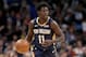 DENVER, COLORADO - MARCH 02: Jrue Holiday #11 of the New Orleans Pelicans plays the Denver Nuggets at the Pepsi Center on March 02, 2019 in Denver, Colorado. NOTE TO USER: User expressly acknowledges and agrees that, by downloading and or using this photograph, User is consenting to the terms and conditions of the Getty Images License Agreement. (Photo by Matthew Stockman/Getty Images)