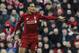 Liverpool's Virgil van Dijk gestures during the English Premier League soccer match between Liverpool and AFC Bournemouth at Anfield stadium in Liverpool, England, Saturday, Feb. 9, 2019. (AP Photo/Rui Vieira)