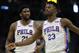 Philadelphia 76ers' Joel Embiid reacts with Jimmy Butler during the second half of an NBA basketball game against the Milwaukee Bucks Sunday, March 17, 2019, in Milwaukee. The 76ers won 130-125. (AP Photo/Aaron Gash)