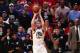 LOS ANGELES, CALIFORNIA - APRIL 21: Klay Thompson #11 of the Golden State Warriors shoots the ball against Lou Williams #23 of the Los Angeles Clippers during the second half of Game Four of Round One of the 2019 NBA Playoffs at Staples Center on April 21, 2019 in Los Angeles, California. NOTE TO USER: User expressly acknowledges and agrees that, by downloading and or using this photograph, User is consenting to the terms and conditions of the Getty Images License Agreement. (Photo by Yong Teck Lim/Getty Images)