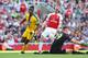LONDON, ENGLAND - APRIL 21: Wilfried Zaha of Crystal Palace celebrates after scoring his team's second goal whilst Shkodran Mustafi of Arsenal reacts during the Premier League match between Arsenal FC and Crystal Palace at Emirates Stadium on April 21, 2019 in London, United Kingdom. (Photo by Warren Little/Getty Images)