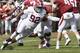 Alabama defensive lineman Quinnen Williams puts the pressure on Arkansas quarterback Ty Storey in the second half of an NCAA college football game Saturday, Oct. 6, 2018, in Fayetteville, Ark. (AP Photo/Michael Woods)
