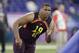 Alabama defensive lineman Quinnen Williams runs a drill during the NFL football scouting combine, Sunday, March 3, 2019, in Indianapolis. (AP Photo/Darron Cummings)