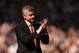 Manchester United's Norwegian manager Ole Gunnar Solskjaer applauds the fans after the final whistle in the English Premier League football match between Everton and Manchester United at Goodison Park in Liverpool, north west England on April 21, 2019. (Photo by Oli SCARFF / AFP) / RESTRICTED TO EDITORIAL USE. No use with unauthorized audio, video, data, fixture lists, club/league logos or 'live' services. Online in-match use limited to 120 images. An additional 40 images may be used in extra time. No video emulation. Social media in-match use limited to 120 images. An additional 40 images may be used in extra time. No use in betting publications, games or single club/league/player publications. / (Photo credit should read OLI SCARFF/AFP/Getty Images)