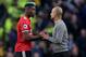 MANCHESTER, ENGLAND - APRIL 07: Paul Pogba of Manchester United speaks with Josep Guardiola, Manager of Manchester City after the Premier League match between Manchester City and Manchester United at Etihad Stadium on April 7, 2018 in Manchester, England. (Photo by Laurence Griffiths/Getty Images)