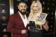 NEW YORK, NEW YORK - APRIL 05: WWE Superstars Andrade and Charlotte Flair attend the WWE Superstars For Hope Reception on April 05, 2019 in New York City. (Photo by Brian Ach/Getty Images for WWE)