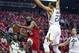 Houston Rockets guard James Harden (13) drives to the basket against Utah Jazz center Rudy Gobert (27) during the first half in Game 5 of an NBA basketball playoff series, in Houston, Wednesday, April 24, 2019. (AP Photo/David J. Phillip)