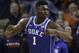 Duke's Zion Williamson (1) reacts after scoring against North Carolina during the second half of an NCAA college basketball game in the Atlantic Coast Conference tournament in Charlotte, N.C., Friday, March 15, 2019. (AP Photo/Chuck Burton)