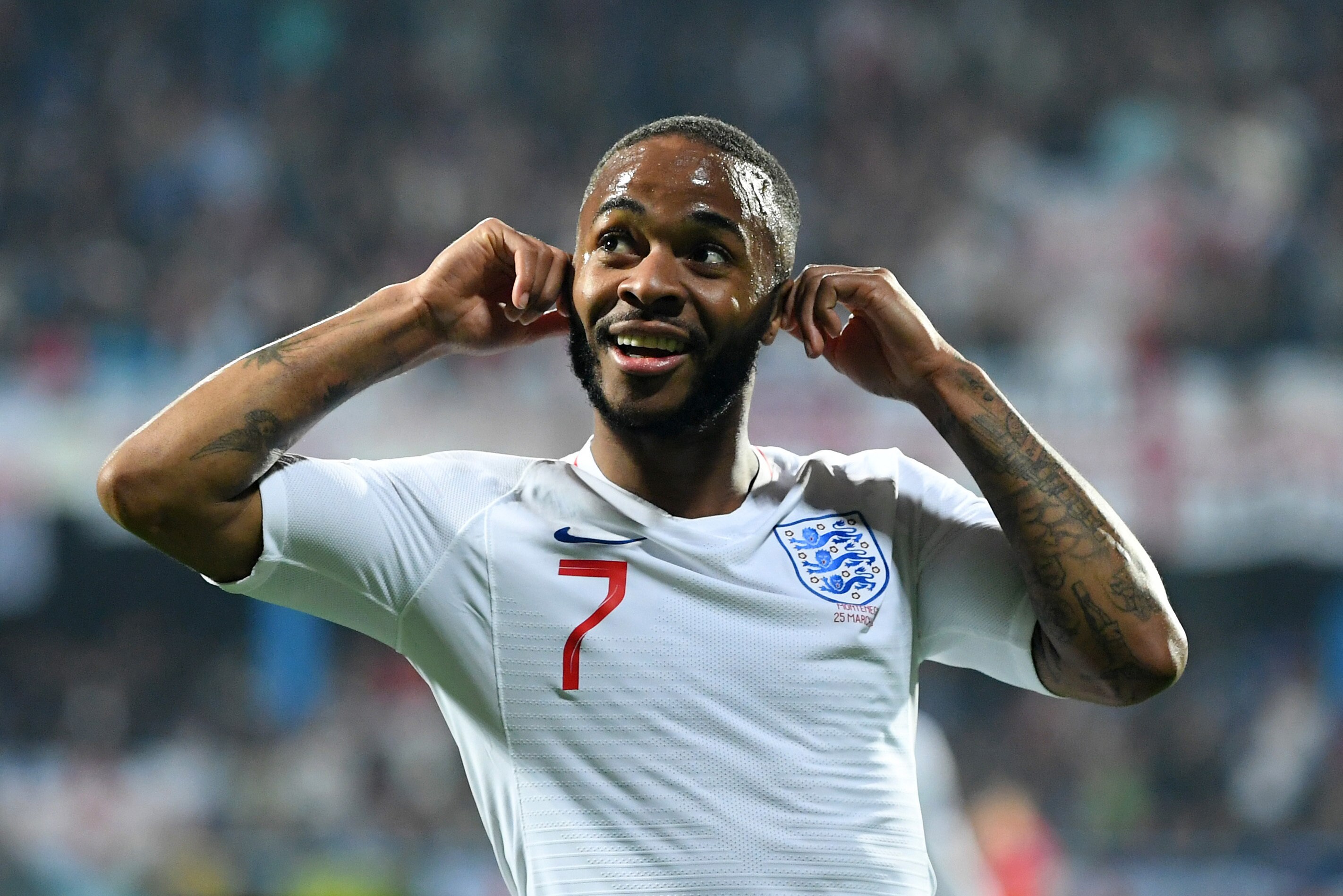 PODGORICA, MONTENEGRO - MARCH 25:  Raheem Sterling of England celebrates after scoring his team's fifth goal during the 2020 UEFA European Championships Group A qualifying match between Montenegro and England at Podgorica City Stadium on March 25, 2019 in Podgorica, Montenegro. (Photo by Michael Regan/Getty Images)