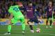 Levante's Spanish defender Coke (L) vies with Barcelona's Argentinian forward Lionel Messi during the Spanish League football match between FC Barcelona and Levante UD at the Camp Nou stadium in Barcelona on April 27, 2019. (Photo by LLUIS GENE / AFP) (Photo credit should read LLUIS GENE/AFP/Getty Images)