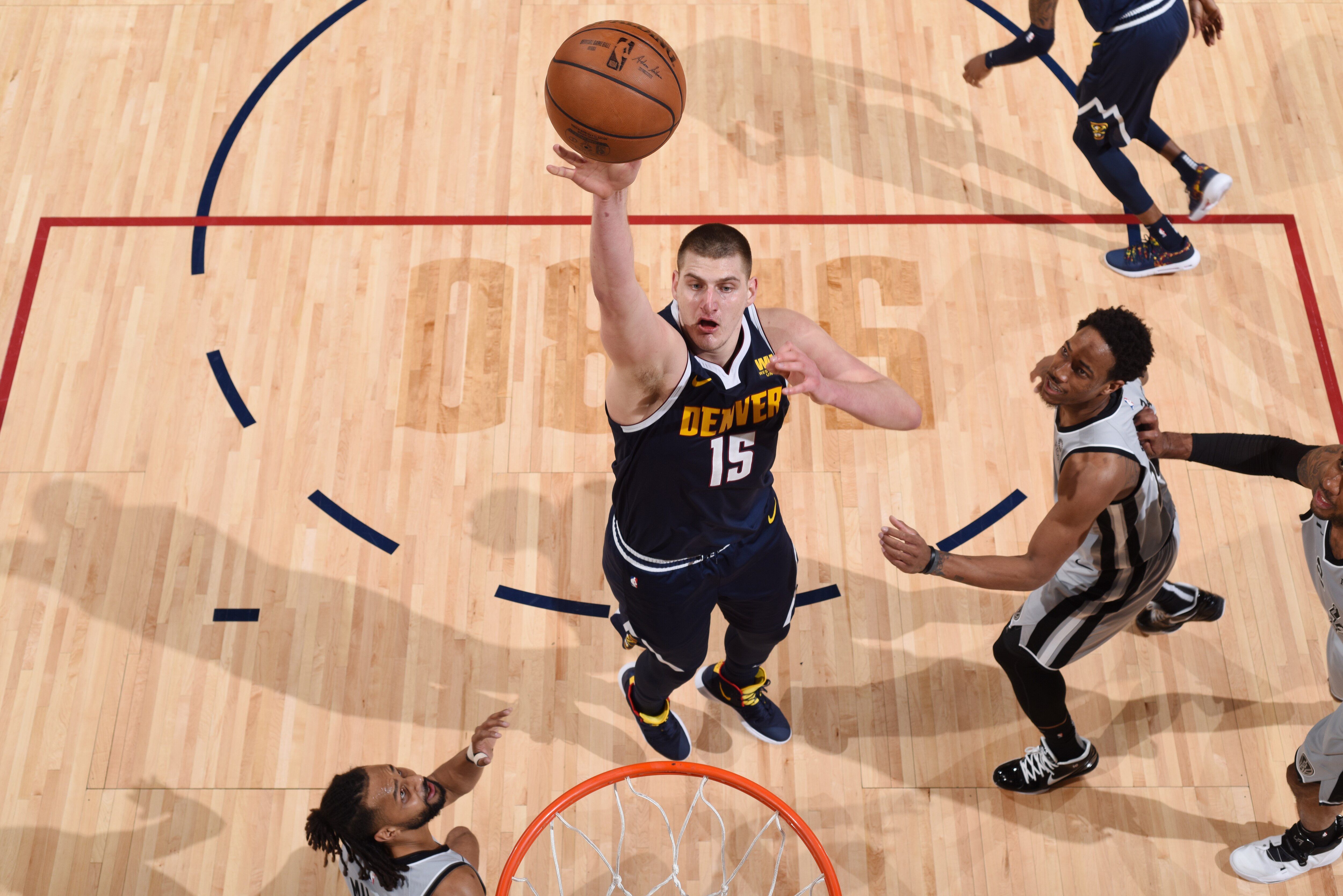 DENVER, CO - APRIL 27: Nikola Jokic #15 of the Denver Nuggets shoots the ball against the San Antonio Spurs during Game Seven of Round One of the 2019 NBA Playoffs on April 27, 2019 at the Pepsi Center in Denver, Colorado. NOTE TO USER: User expressly acknowledges and agrees that, by downloading and/or using this Photograph, user is consenting to the terms and conditions of the Getty Images License Agreement. Mandatory Copyright Notice: Copyright 2019 NBAE (Photo by Garrett Ellwood/NBAE via Getty Images)