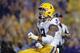 FILE - In this Sept. 29, 2018, file photo, LSU safety Grant Delpit (9) celebrates his sack of Mississippi quarterback Jordan Ta'amu during the first half of a game in Baton Rouge, La. Delpit was named to the 2018 AP All-America NCAA college football team, Monday, Dec. 10, 2018. (AP Photo/Gerald Herbert, File)