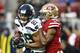 SANTA CLARA, CA - DECEMBER 16: Doug Baldwin #89 of the Seattle Seahawks is hit after a catch by Antone Exum #38 of the San Francisco 49ers during their NFL game at Levi's Stadium on December 16, 2018 in Santa Clara, California. (Photo by Ezra Shaw/Getty Images)