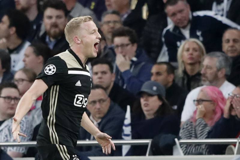 Ajax's Donny van de Beek celebrates scoring his side's first goal during the Champions League semifinal first leg soccer match between Tottenham Hotspur and Ajax at the Tottenham Hotspur stadium in London, Tuesday, April 30, 2019. (AP Photo/Frank Augstein)