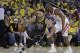 Golden State Warriors' Stephen Curry, left, dribbles past Houston Rockets' Chris Paul during the second half of Game 2 of a second-round NBA basketball playoff series in Oakland, Calif., Tuesday, April 30, 2019. (AP Photo/Jeff Chiu)