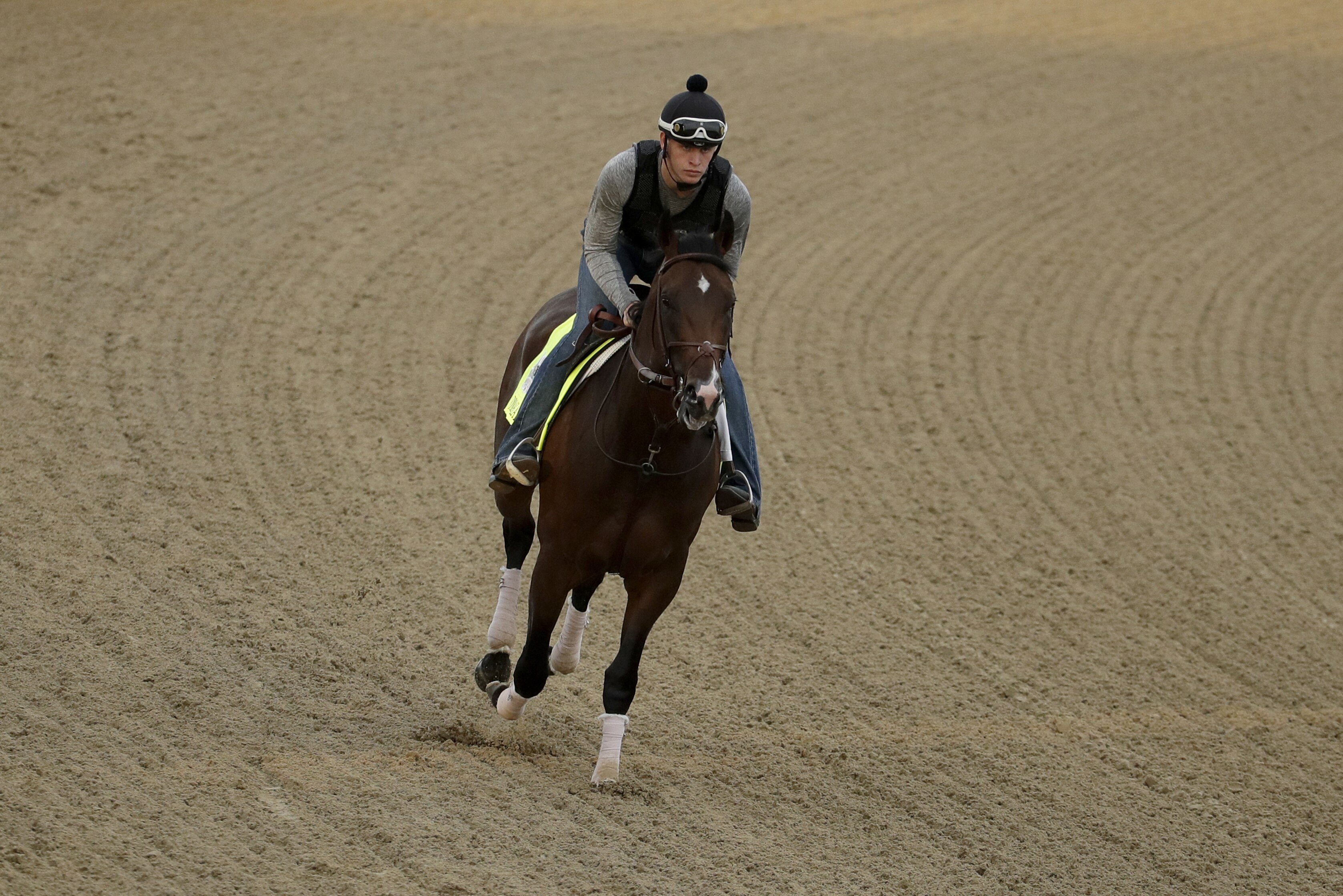 Exercise rider Taylor Cambra rides Kentucky Derby entrant Omaha Beach during a workout at Churchill Downs Wednesday, May 1, 2019, in Louisville, Ky. The 145th running of the Kentucky Derby is scheduled for Saturday, May 4. (AP Photo/Charlie Riedel)