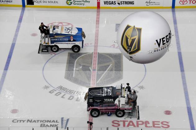 LAS VEGAS, NV - MARCH 31: Richard Crossley (above) and Nick Salami operate ice resurfacers in the rink under the Vegas Golden Knights ZipBlimp before a game between the San Jose Sharks and the Golden Knights at T-Mobile Arena on March 31, 2018 in Las Vegas, Nevada. The Golden Knights won 3-2 and clinched the Pacific Division title. (Photo by Ethan Miller/Getty Images)
