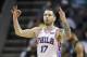 Philadelphia 76ers' JJ Redick (17) reacts after making a 3-point basket against the Charlotte Hornets during the first half of an NBA basketball game in Charlotte, N.C., Tuesday, March 19, 2019. (AP Photo/Chuck Burton)