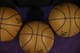 Basketballs are seen on the court during warm ups before the Dallas Mavericks played the Sacramento Kings in an NBA basketball game in Sacramento, Calif., Monday, Nov. 30, 2015.(AP Photo/Rich Pedroncelli)