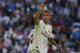 Real Madrid's Mariano Diaz celebrates after scoring his side's 3rd goal during a Spanish La Liga soccer match between Real Madrid and Villarreal at the Santiago Bernabeu stadium in Madrid, Spain, Sunday, May 5, 2019. (AP Photo/Paul White)