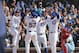 CHICAGO, ILLINOIS - MAY 04: Taylor Davis #53 of the Chicago Cubs is congratulated by teammates at the home plate following his grand slam during the fourth inning of a game against the St. Louis Cardinals at Wrigley Field on May 04, 2019 in Chicago, Illinois. (Photo by Nuccio DiNuzzo/Getty Images)