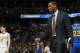 Golden State Warriors assistant coach Jarron Collins in the first half of an NBA basketball game Monday, Feb. 13, 201, in Denver. (AP Photo/David Zalubowski)