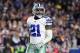 LOS ANGELES, CA - JANUARY 12: Ezekiel Elliott #21 of the Dallas Cowboys celebrates after scoring a 1 yard touchdown in the third quarter against the Los Angeles Rams in the NFC Divisional Playoff game at Los Angeles Memorial Coliseum on January 12, 2019 in Los Angeles, California. (Photo by Harry How/Getty Images)