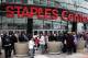 FILE - In this March 19, 2011 file photo, basketball fans wait outside Staples Center before an NBA basketball game between the Los Angeles Clippers and the Cleveland Cavaliers in Los Angeles. With three permanent sports teams and a jam-packed slate of concerts and shows, Staples Center is always among the world’s busiest arenas, but this weekend will be the craziest on record. After a remarkable run of postseason success, the NBA’s Lakers and Clippers and the NHL’s Kings are combining to host six playoff games in a jaw-dropping four days _ and with a major cycling race finishing right outside the building Sunday, no less. (AP Photo/File)
