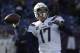 Los Angeles Chargers quarterback Philip Rivers warms up before an NFL divisional playoff football game against the New England Patriots, Sunday, Jan. 13, 2019, in Foxborough, Mass. (AP Photo/Charles Krupa)