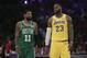 Los Angeles Lakers' LeBron James, right, and Boston Celtics' Kyrie Irving chat during the first half of an NBA basketball game, Saturday, March 9, 2019, in Los Angeles. (AP Photo/Jae C. Hong)