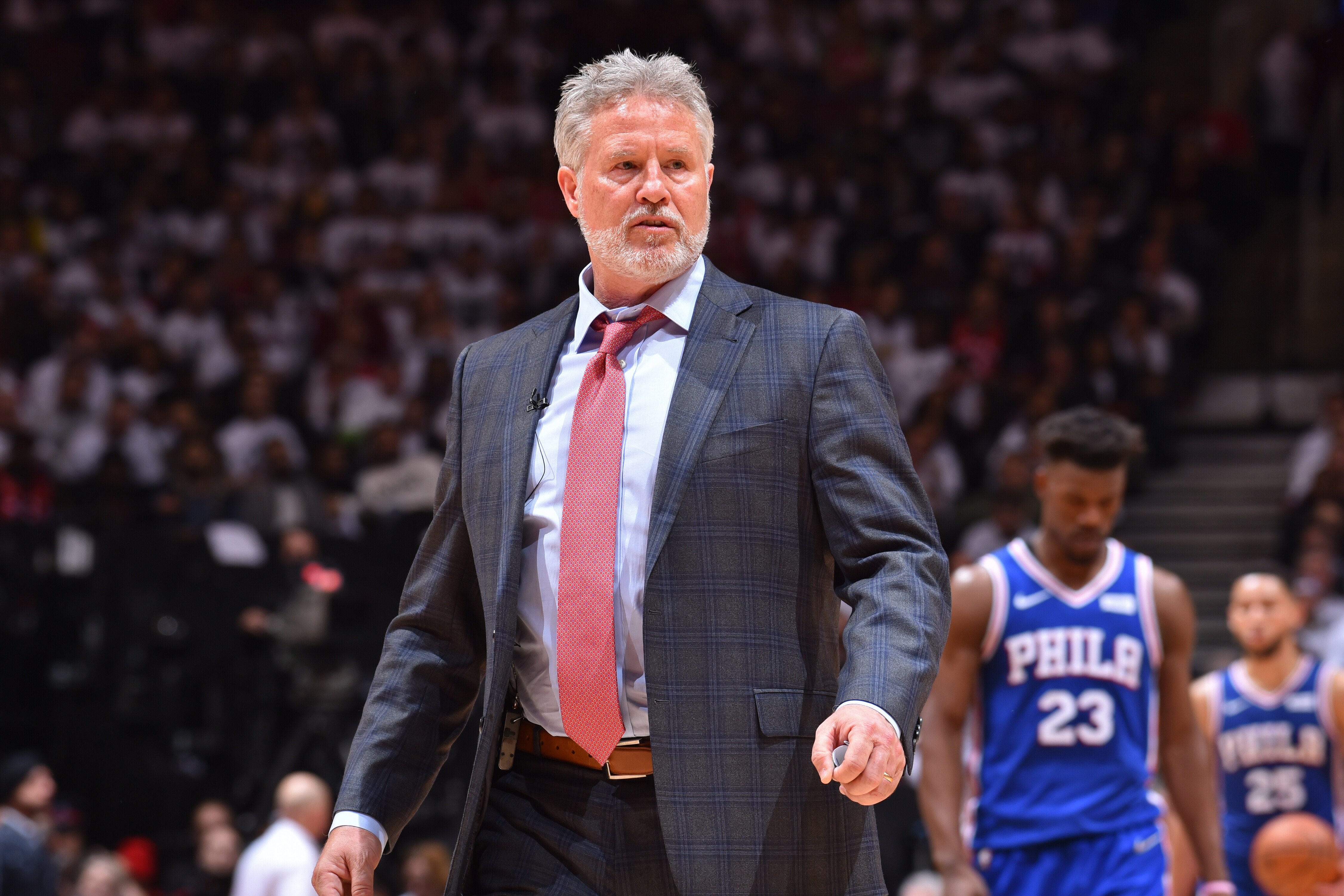 TORONTO, CANADA - APRIL 29: Head Coach Brett Brown of the Philadelphia 76ers looks on against the Toronto Raptors during Game Two of the Eastern Conference Semifinals of the 2019 NBA Playoffs on April 29, 2019 at Scotiabank Arena in Toronto, Ontario, Canada. NOTE TO USER: User expressly acknowledges and agrees that, by downloading and/or using this photograph, user is consenting to the terms and conditions of the Getty Images License Agreement. Mandatory Copyright Notice: Copyright 2019 NBAE (Photo by Jesse D. Garrabrant/NBAE via Getty Images)