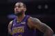 Los Angeles Lakers forward LeBron James stands on the court during the second half of an NBA basketball game against the Brooklyn Nets Friday, March 22, 2019, in Los Angeles. The Nets won 111-106. (AP Photo/Mark J. Terrill)
