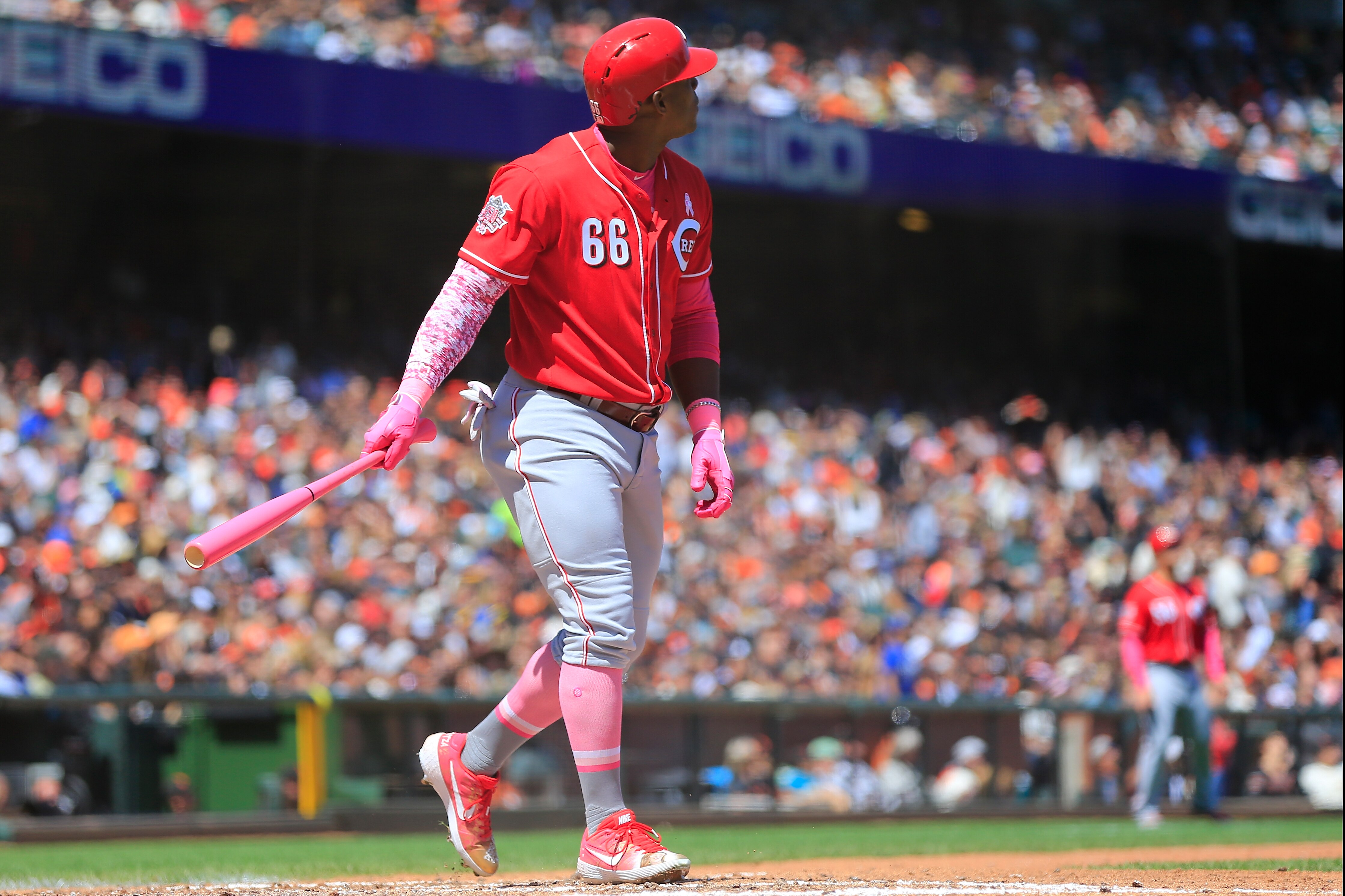 SAN FRANCISCO, CALIFORNIA - MAY 12: Yasiel Puig #66 of the Cincinnati Reds hits a home run during the sixth inning against the San Francisco Giants at Oracle Park on May 12, 2019 in San Francisco, California. (Photo by Daniel Shirey/Getty Images)