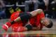 Portland Trail Blazers guard Rodney Hood reacts after being injured in the second half of Game 7 of an NBA basketball second-round playoff series against the Denver Nuggets Sunday, May 12, 2019, in Denver. (AP Photo/John Leyba)