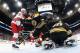 BOSTON, MASSACHUSETTS - MAY 12: Brandon Carlo #25 of the Boston Bruins moves Sebastian Aho #20 of the Carolina Hurricanes out of the crease in Game Two of the Eastern Conference Final during the 2019 NHL Stanley Cup Playoffs at TD Garden on May 12, 2019 in Boston, Massachusetts. (Photo by Bruce Bennett/Getty Images)