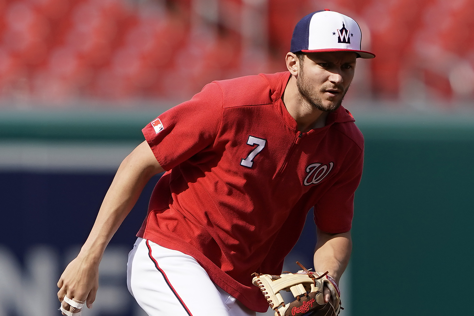 Washington Nationals' Trea Turner wears patriotic batting gloves