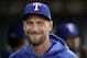 Texas Rangers' Hunter Pence smiles in the dugout prior to the baseball game against the Oakland Athletics Monday, April 22, 2019, in Oakland, Calif. (AP Photo/Ben Margot)