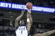 FILE - In this March 24, 2019, file photo, Duke forward Zion Williamson (1) attempts to shoot against Central Florida forward Chad Brown (21) during the first half of a second-round game in the NCAA men's college basketball tournament, in Columbia, S.C. Duke's Zion Williamson and R.J. Barrett are the second freshman teammates to earn first-team All-America honors. Williamson and Barrett headed The Associated Press All-America team released on Tuesday, April 2, 2019, joined by Tennessee's Grant Williams, Murray State's Ja Morant and Cassius Winston of Michigan State. (AP Photo/Sean Rayford, File)