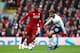LIVERPOOL, ENGLAND - MARCH 31: Georginio Wijnaldum of Liverpool and Dele Alli of Tottenham Hotspur during the Premier League match between Liverpool FC and Tottenham Hotspur at Anfield on March 31, 2019 in Liverpool, United Kingdom. (Photo by Clive Brunskill/Getty Images)