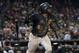Pittsburgh Pirates' Josh Bell drops his bat after hitting a home run against the Arizona Diamondbacks during the eighth inning of a baseball game Tuesday, May 14, 2019, in Phoenix. (AP Photo/Matt York)