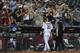PHOENIX, ARIZONA - MAY 15: Zack Greinke #21 of the Arizona Diamondbacks leaves the game against the Pittsburgh Pirates in the eighth inning with head athletic trainer Ryan DiPanfilo at Chase Field on May 15, 2019 in Phoenix, Arizona. (Photo by Jennifer Stewart/Getty Images)