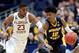 HARTFORD, CONNECTICUT - MARCH 23: Ja Morant #12 of the Murray State Racers is defended by M.J. Walker #23 of the Florida State Seminoles in the first half during the second round of the 2019 NCAA Men's Basketball Tournament at XL Center on March 23, 2019 in Hartford, Connecticut. (Photo by Rob Carr/Getty Images)