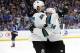 San Jose Sharks defenseman Erik Karlsson (65), of Sweden, celebrates with Gustav Nyquist (14), of Sweden, after Karlsson scored the winning goal against the St. Louis Blues during overtime in Game 3 of the NHL hockey Stanley Cup Western Conference final series Wednesday, May 15, 2019, in St. Louis. The Sharks won 5-4 to take a 2-1 lead in the series. (AP Photo/Jeff Roberson)