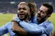 GELSENKIRCHEN, GERMANY - FEBRUARY 20: Raheem Sterling of Manchester City celebrates 2-3 with Fernandinho of Manchester City, Bernardo Silva of Manchester City during the UEFA Champions League match between Schalke 04 v Manchester City at the Veltins Arena on February 20, 2019 in Gelsenkirchen Germany (Photo by Eric Verhoeven/Soccrates/Getty Images)